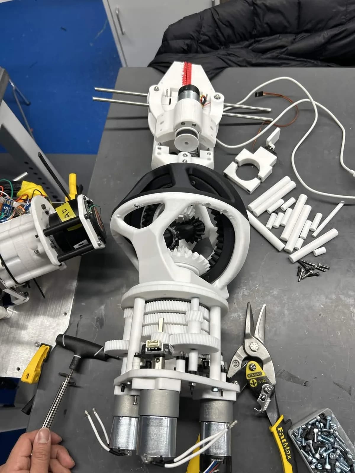 Fully built 3-DOF rover wrist on the bench, concentric gear train exposed