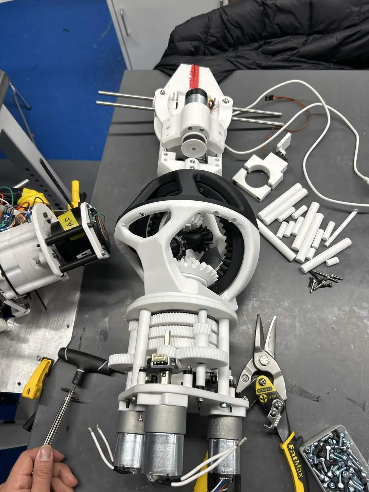 The fully built 3-DOF wrist and manipulator assembly on the workbench